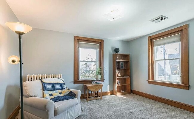 Building Photo - Spacious 4-Bedroom Home with Sunroom, Garage & Private Driveway!