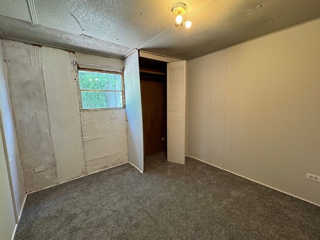 Building Photo - 2BR/1BA Mobile Home on ½ Acre – Pet-Friendly – Lake City, FL