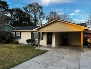 Building Photo - 2 Bedroom, 1 bathroom, Brick home , Stainless appliances, with Large Yard and Covered Parking.