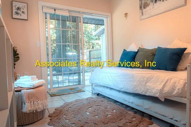 Building Photo - Beautifully furnished  2-Bedroom Duplex – ...