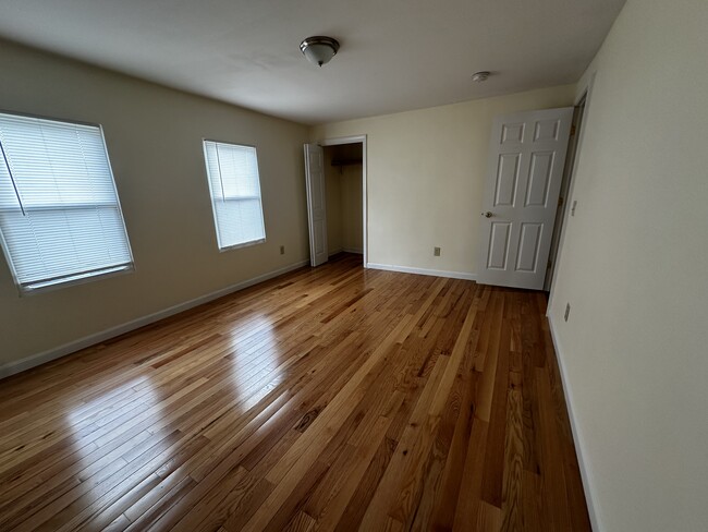 Primary bedroom closet and entry door open - 58 Lake St