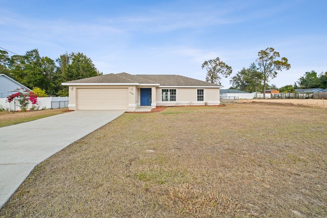 Building Photo - Fenced & Tiled 3/2/2 Summerfield Home For ...