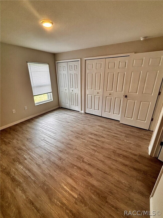 Building Photo - 9437 N Travis Dr