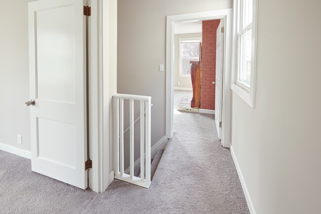 Top landing of staircase with access to second and third bedrooms - 2354 Victor St