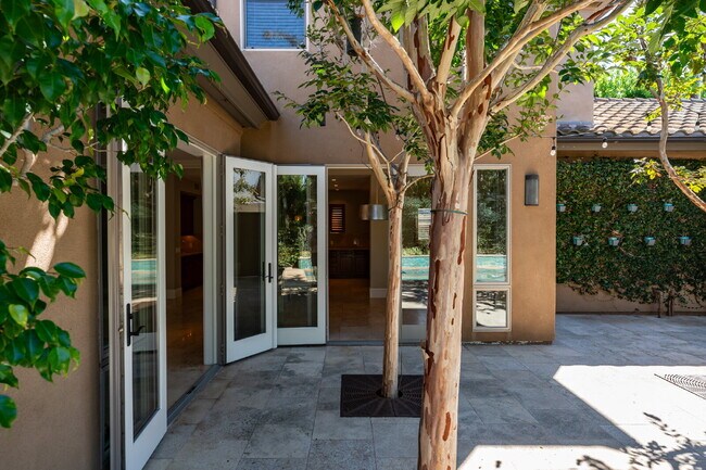 Building Photo - Sophisticated Mediterranean Villa in Newpo...