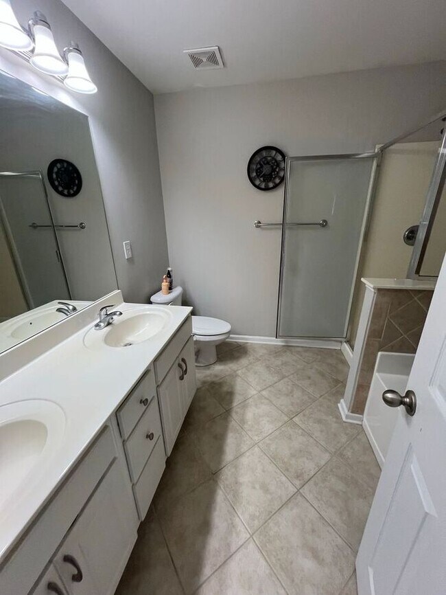 Building Photo - Spacious 2-Bedroom Townhome with Finished Studio Suite – Prime Location!
