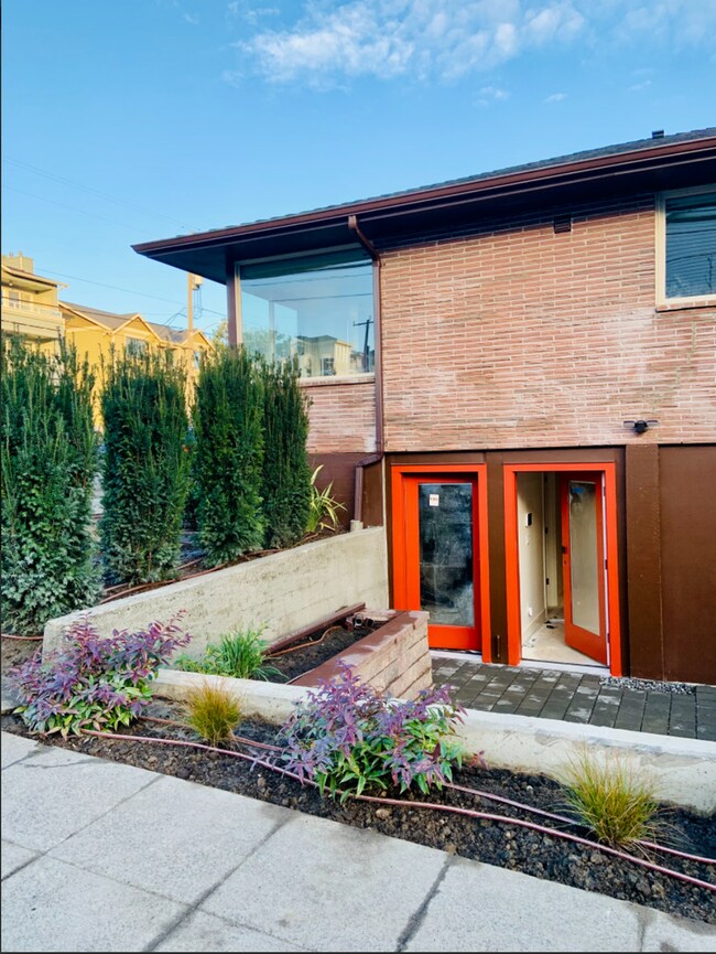 Building Photo - Ballard Gem! Updated Apartment w/ Parking, Bright Interiors & Steps to Dining + Parks