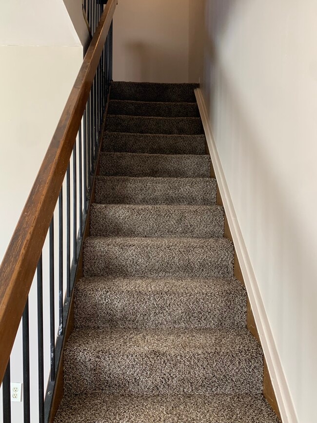 Heading upstairs to bedrooms & bathroom - 4111 Charter Oak Dr