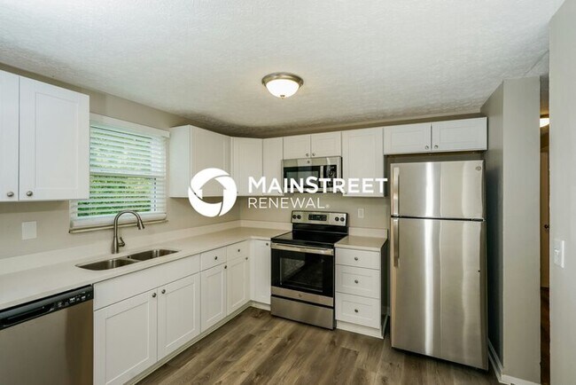 Building Photo - 4 Bedroom Pet-Friendly Home in JEFFERSONVILLE, IN with Main Street Renewal