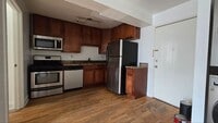 Building Photo - 2BR/1BA in West Ridge – In-Unit Laundry, A/C, Pet Friendly