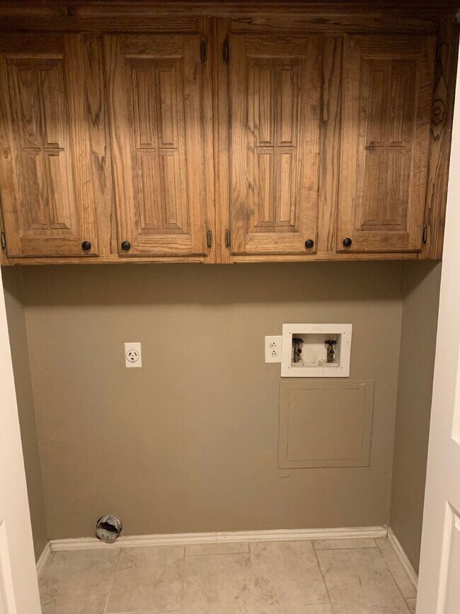 Building Photo - Spacious South Lubbock Townhome with Bonus Space & 2-Car Garage