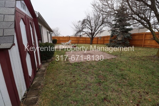 Building Photo - Discover this well-maintained 3-bedroom, 2-bath home in Indianapolis featuring an attached garage...