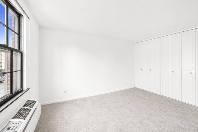 Building Photo - Spacious Rehabbed 1-Bedroom at The Vine | Private Balcony + Parking