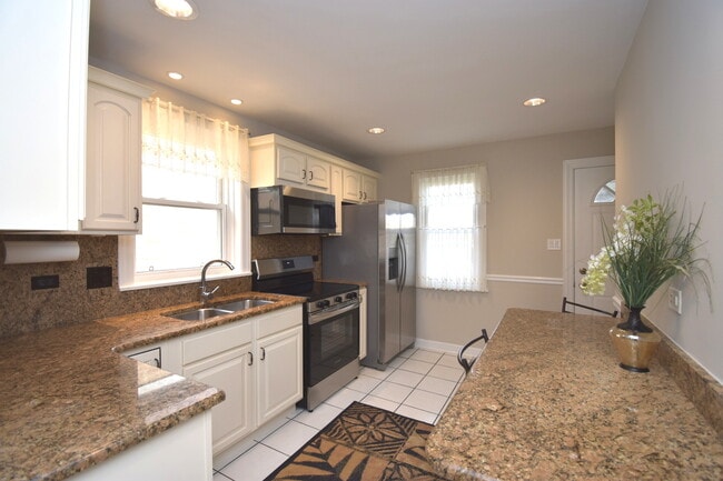 Building Photo - 3855 N Nora Ave