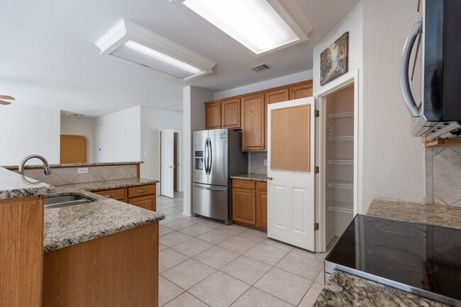 Building Photo - 8818 Firebaugh Dr