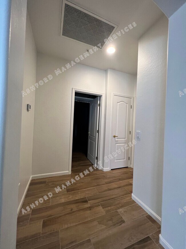 Building Photo - COME HOME TO LUXURY IN GATED GRAYHAWK GOLF...