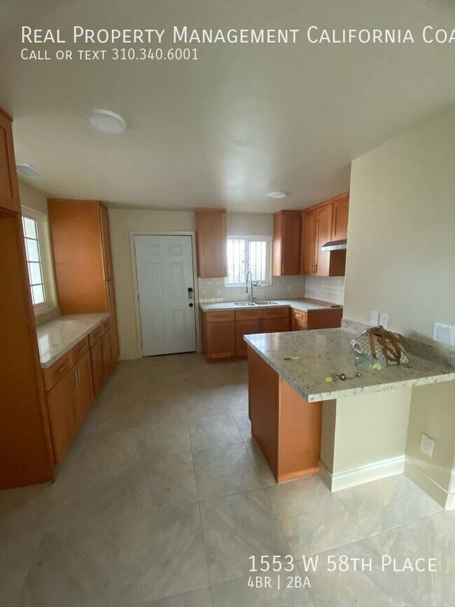 Building Photo - 1553 W 58th Pl