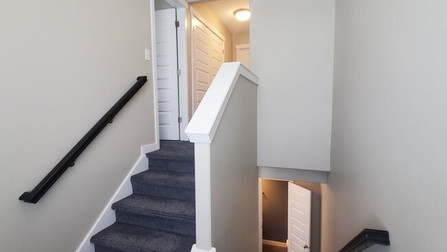 Building Photo - 2 Master Suites Townhome 2 Car Garage