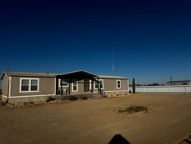 Building Photo - Spacious Four Bedroom Home - Pet Friendly and Horses Allowed!