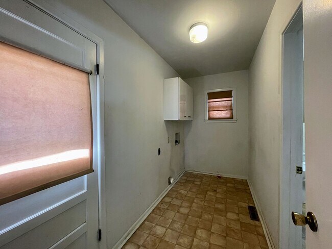 Building Photo - Your New Snyder Sanctuary: Modern Updates, Massive Storage & a Cozy Porch