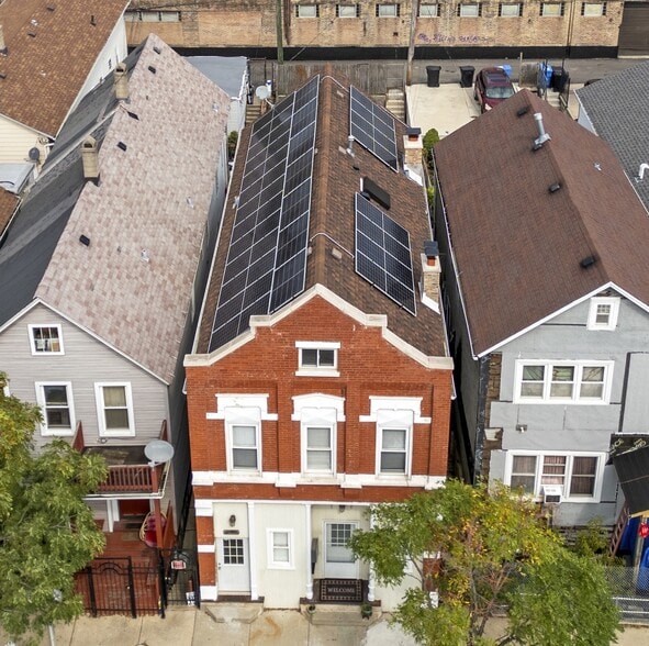 Full Solar maxed roof, providing free electricity to your unit. - 2338 W 18th Pl