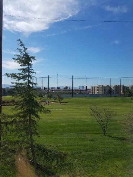 Golf course view from upstairs bedroom - 1505 Hermocilla Way