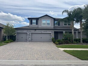 Building Photo - Spacious 5-Bedroom Riverview Home