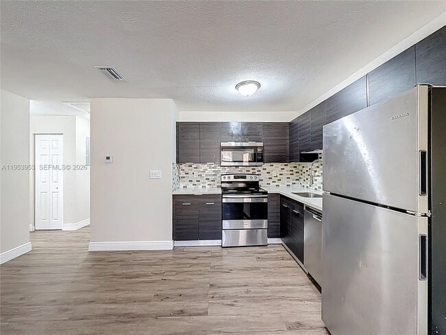 Building Photo - 1800 NW 52nd Ave