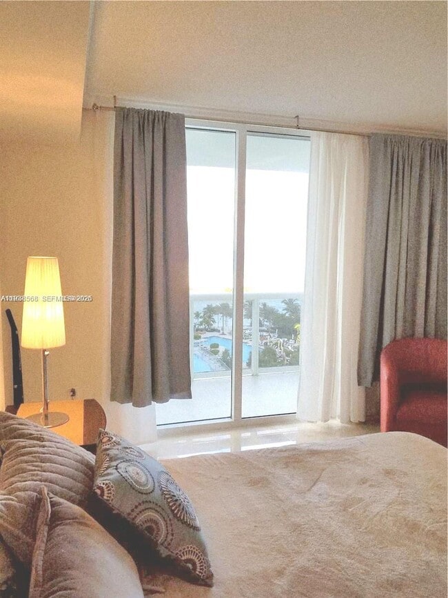 Building Photo - 10275 Collins Ave