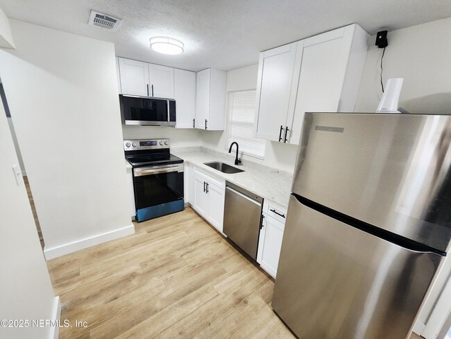 Building Photo - 10235 Monaco Dr