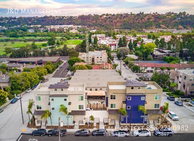 Building Photo - Gorgeous Townhome w/ Rooftop Decks and Oce...