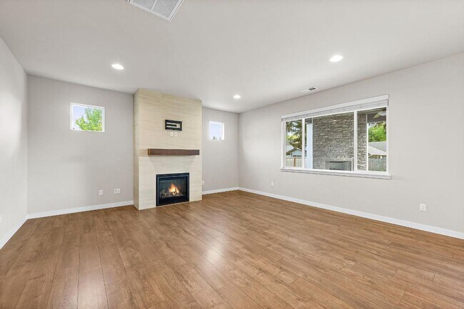 Building Photo - Modern 4-Bedroom Yelm Home with Covered Patio, Outdoor Fireplace & Office/Flex Space!
