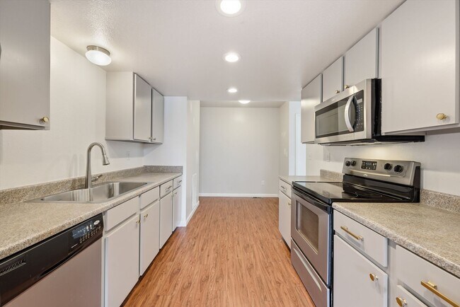 Building Photo - Spacious 4-Bedroom Townhome Backing to Open Space – Attached 2-Car Garage!