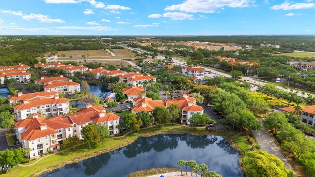 Building Photo - Live the Resort Lifestyle at Tides at Pelican Landing – Furnished 2BR Condo