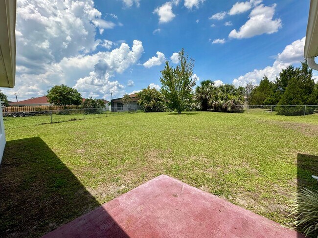 Building Photo - Three-Bedroom House with a Fenced Yard!