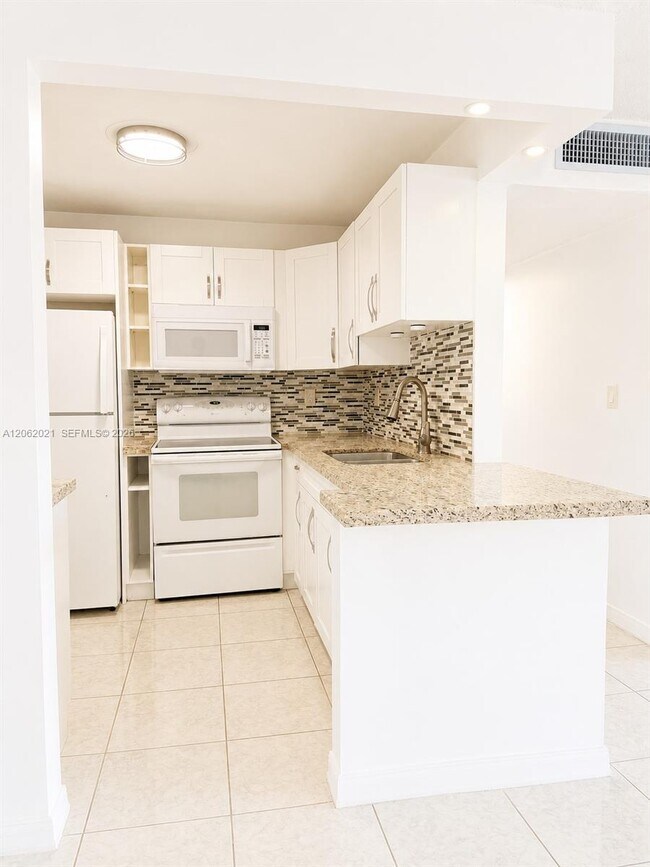 Building Photo - 6095 W 18th Ave