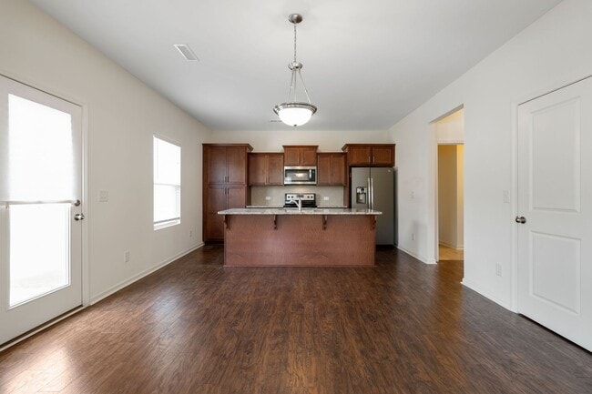 Building Photo - Charming and Spacious 4-Bedroom Home with Two Car Garage, located in Morrisville!