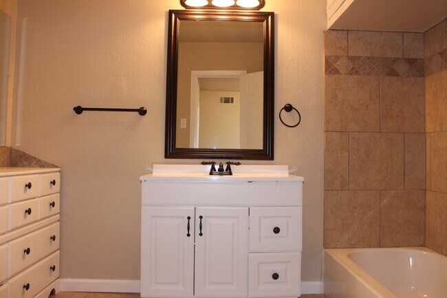 Building Photo - PRE -LEASING FOR AUGUST ! Spacious 4 Bedroom/2 Bath House