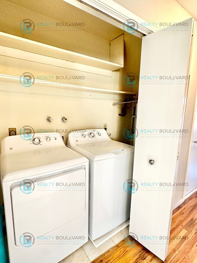 Building Photo - 2-bed, 2-bath, 2-story townhome with pool and park like setting outside the front door.