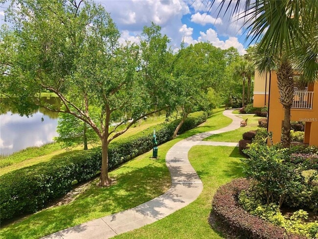Building Photo - 1/1 Third Floor condo in Cypress Fairway