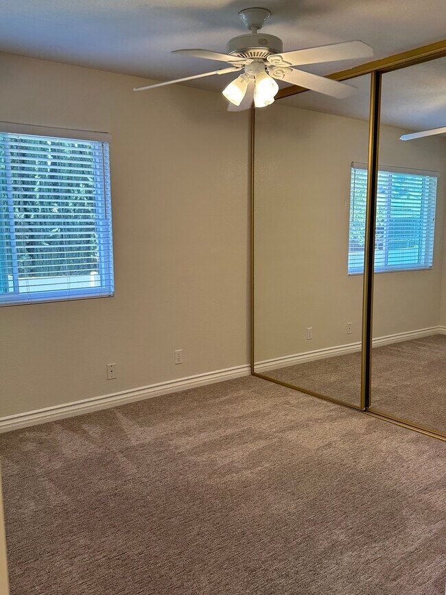 Bedroom # 1: Carpet and Mirror Closet Doors - 13784 Sycamore Tree Ln