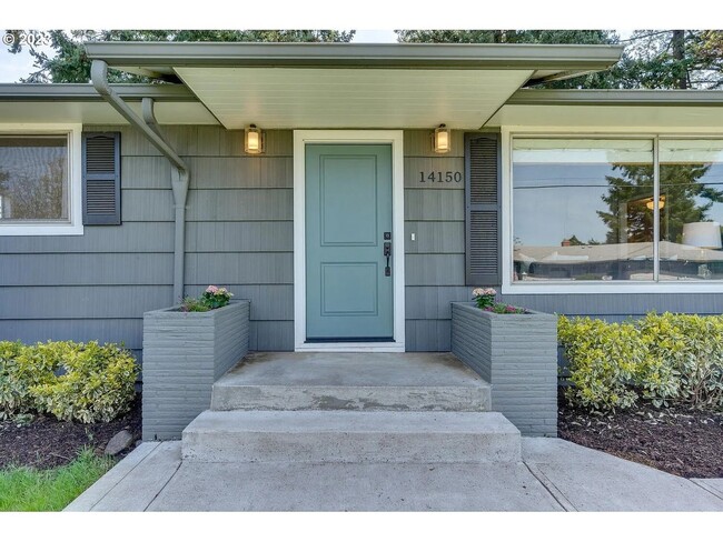 Building Photo - Stylishly Updated Mid-Century Gem on a Qui...
