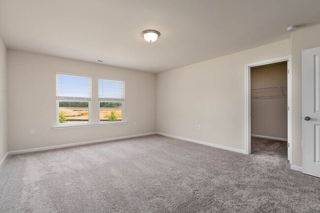 Building Photo - Cozy Townhome with 2 car garage!