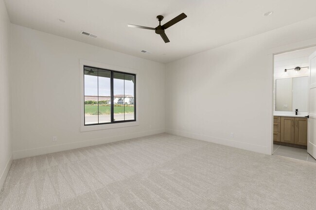 Building Photo - Gorgeous Custom Single Story with RV Garage