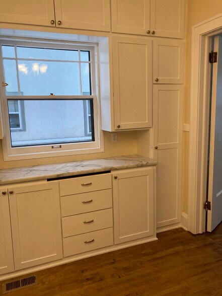 Kitchen with custom built wood cabinets - 4948 Aldrich Ave S