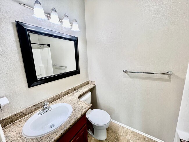 Building Photo - Spacious Remodeled Condo at River Colony C...