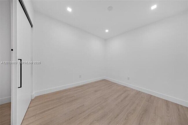 Building Photo - 7901 Hispanola Ave