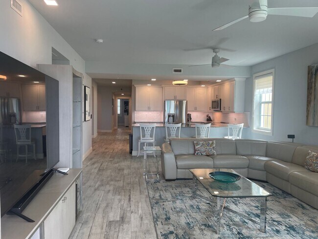 Building Photo - Coastal Luxury at Hidden Bay | 3BR Waterfront Condo with Bay Views
