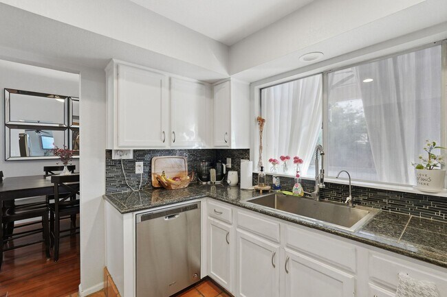 Building Photo - FURNISHED 2 Bedrooms plus den/loft & Private Pool