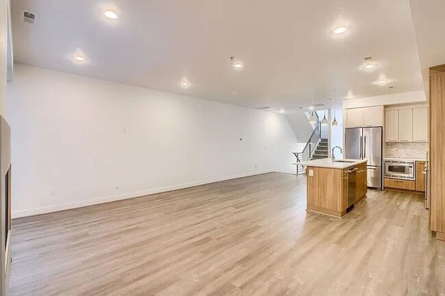Building Photo - Modern LoHi Living with Rooftop Deck & City Views!!